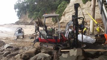 Drilling Of Pile Holes For New Beach Access Staircase In Tidal Environment